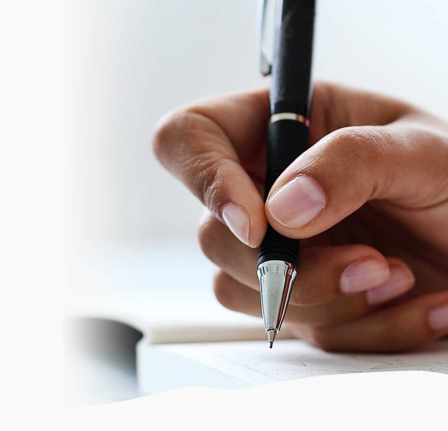 hand holding pen
